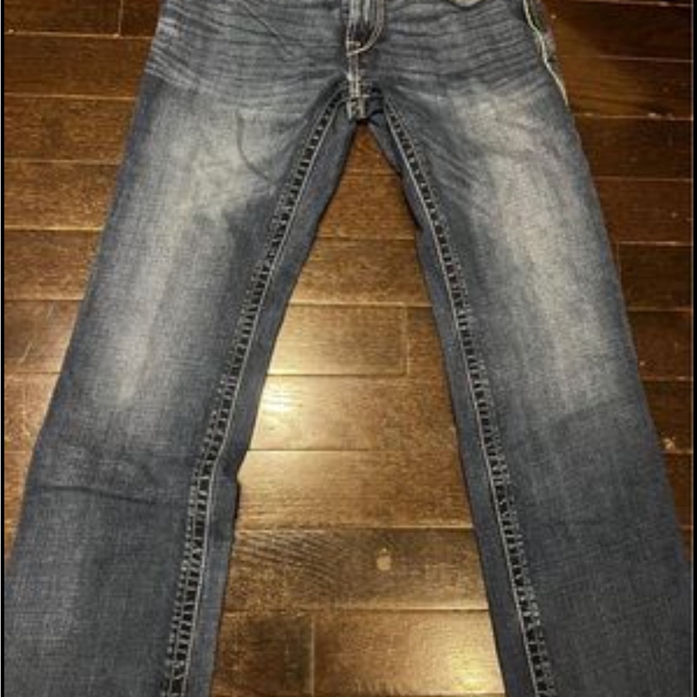 Size 29/34 Dark blue low rise bootcut Ariat jeans